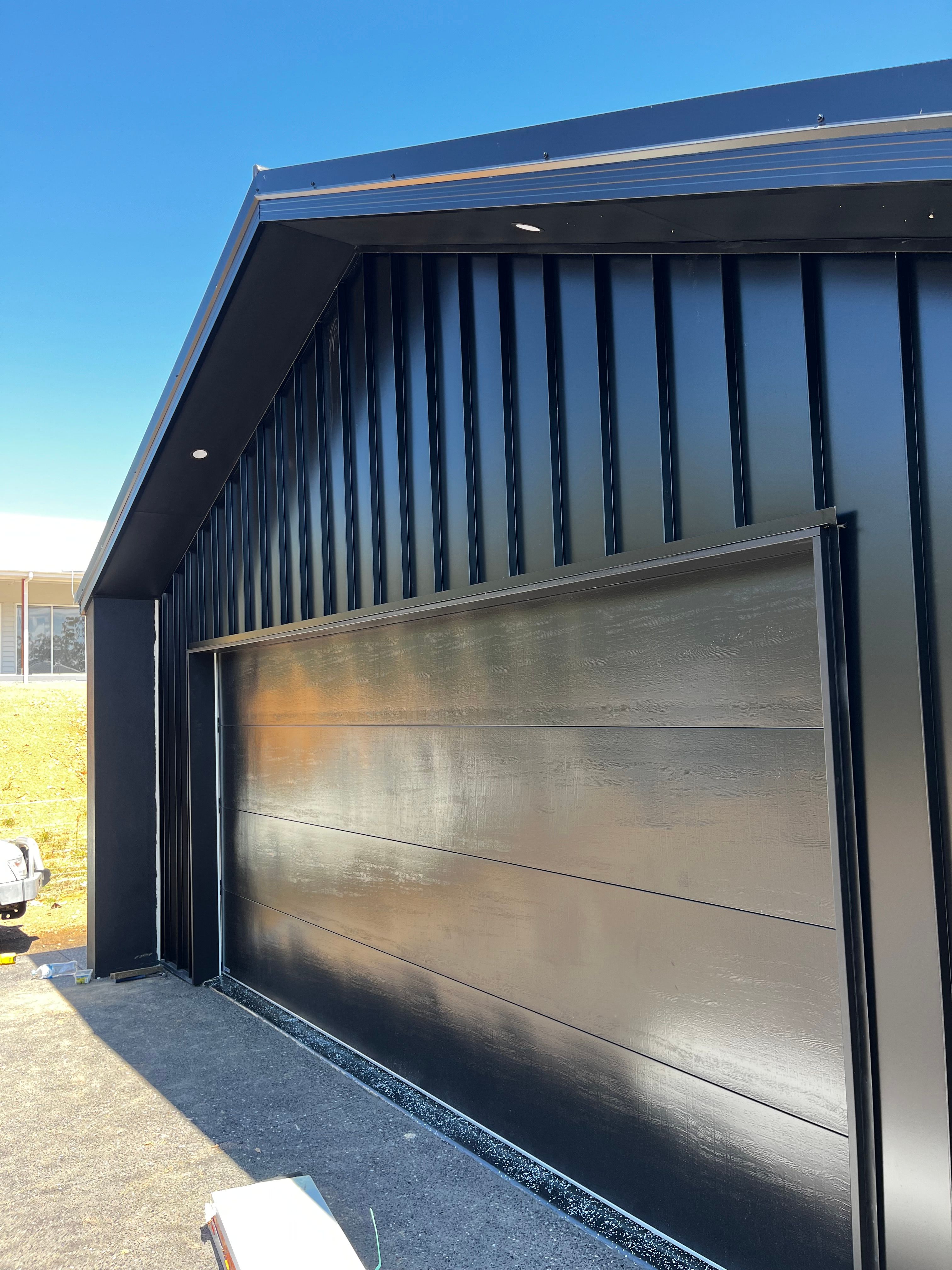 Black Colorbond cladding and roofline closeup
