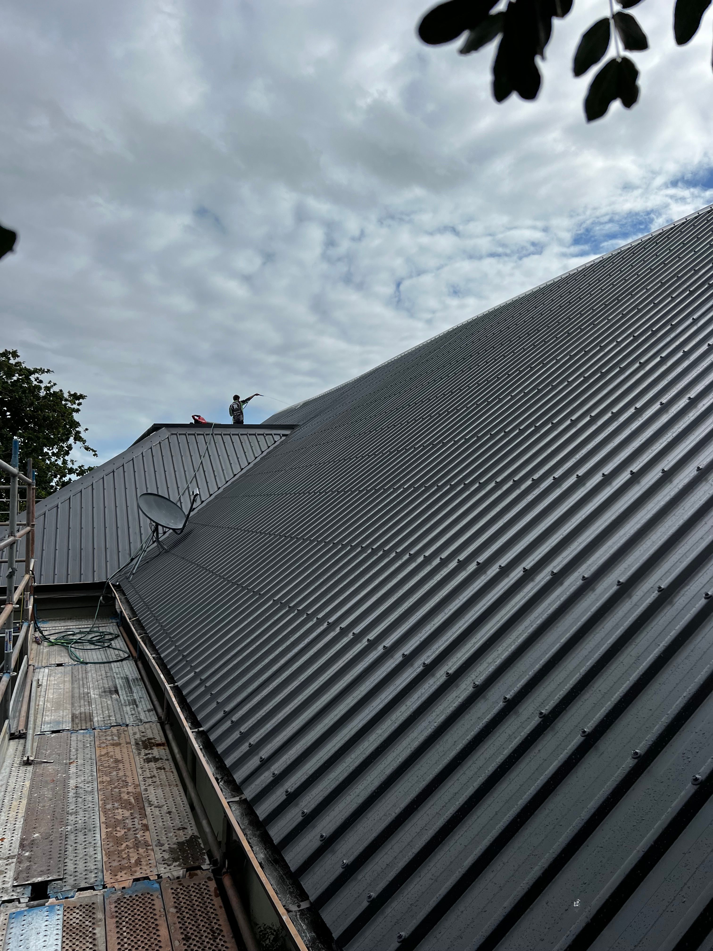 Metal re-roof in progress